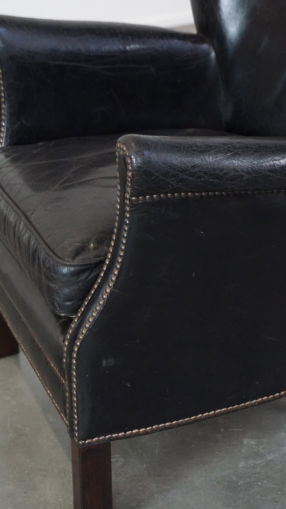 Image 1 of Fauteuil noir avec coussin d'assise réversible en kelim