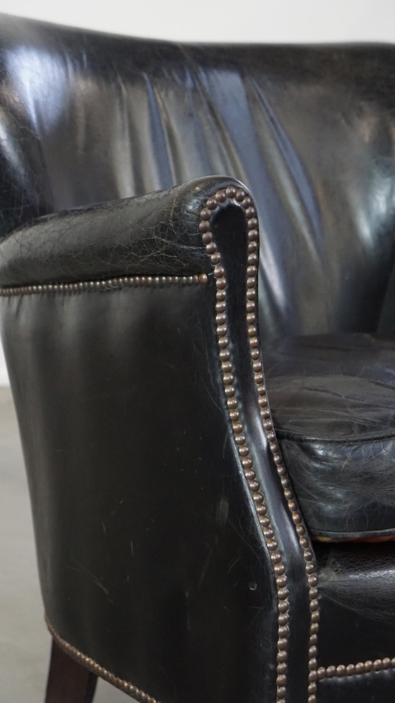 Image 1 of Fauteuil noir avec coussin d'assise réversible en kelim