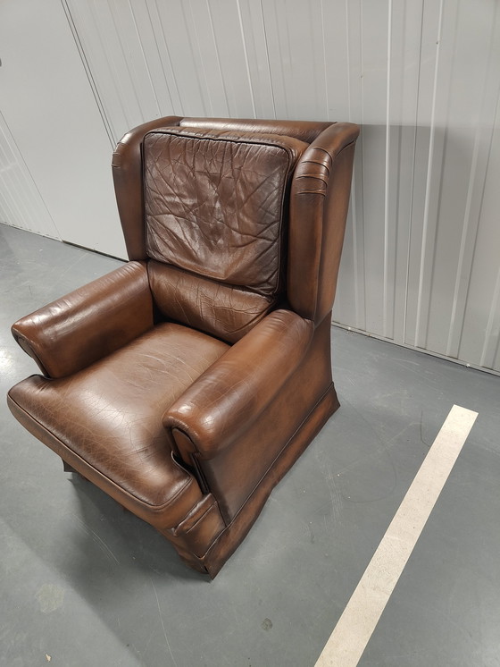 Image 1 of Fauteuil à oreilles en peau de mouton avec coussin d'assise lâche, marque : Muylaert