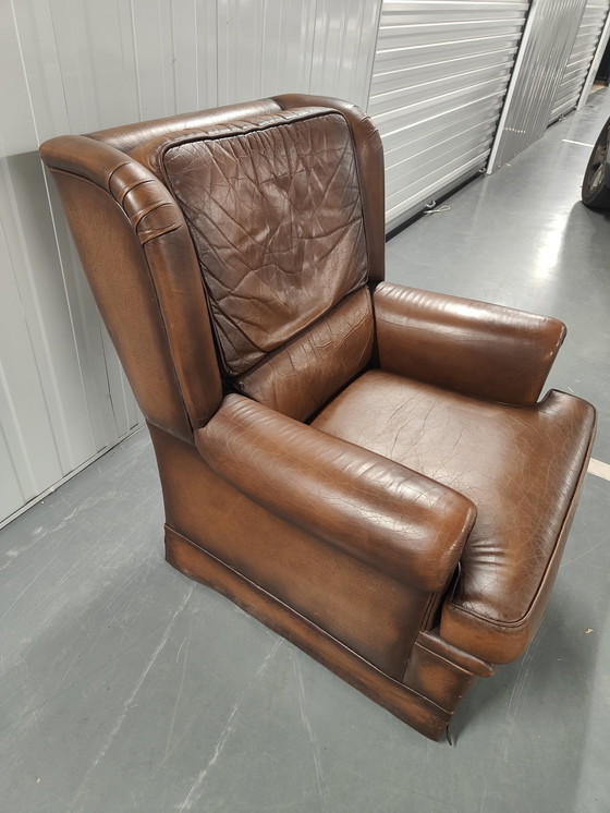 Image 1 of Fauteuil à oreilles en peau de mouton avec coussin d'assise lâche, marque : Muylaert