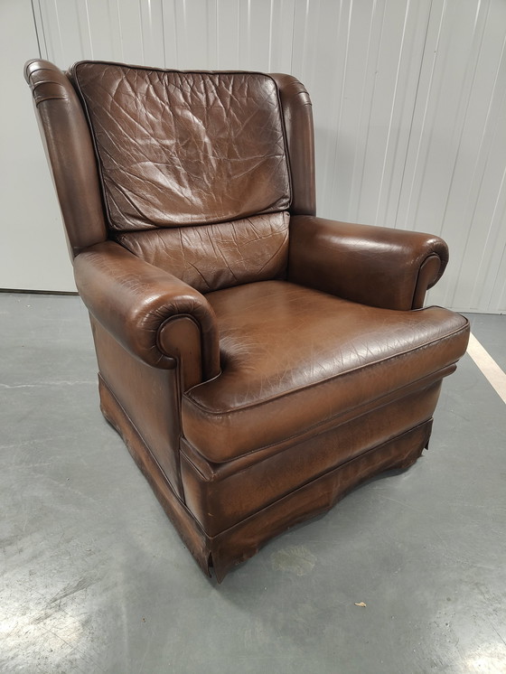 Image 1 of Fauteuil à oreilles en peau de mouton avec coussin d'assise lâche, marque : Muylaert