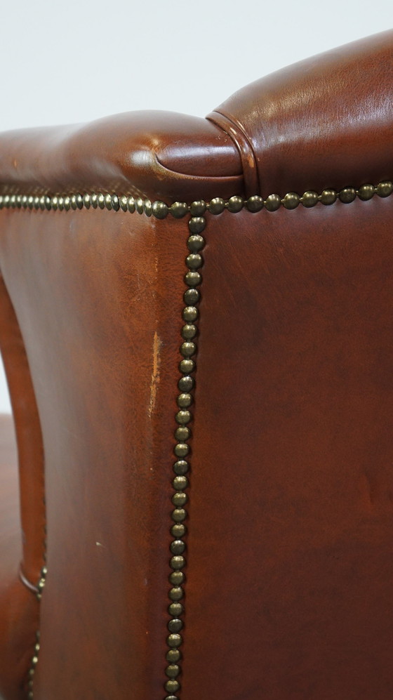 Image 1 of Fauteuil à oreilles en cuir de boeuf