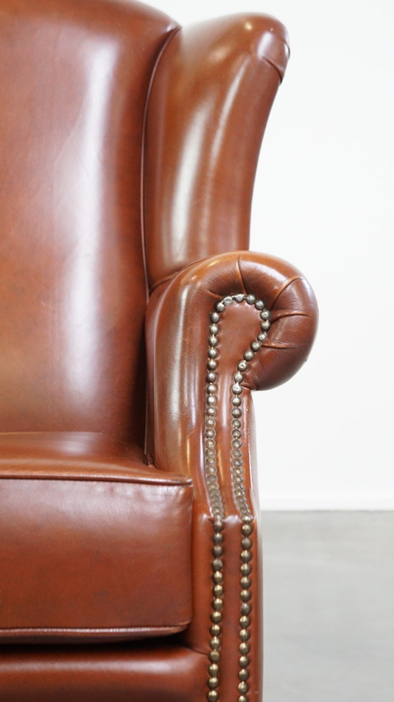 Image 1 of Fauteuil à oreilles en cuir de boeuf