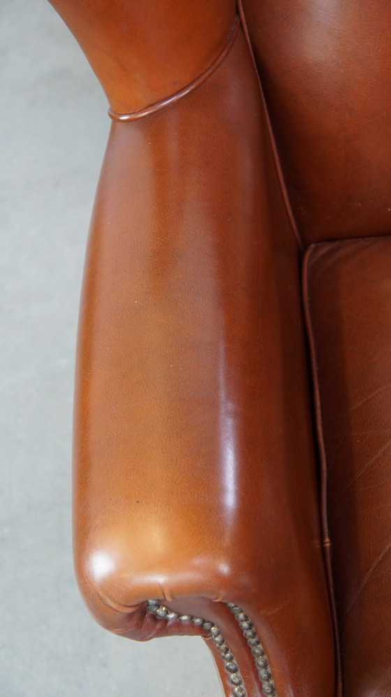 Image 1 of Fauteuil à oreilles en cuir de boeuf