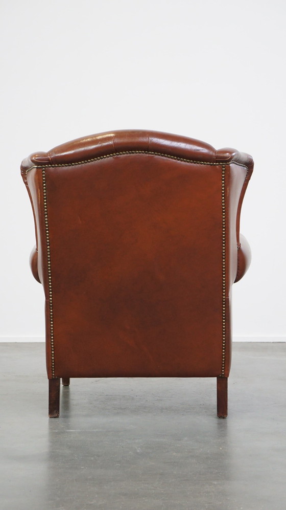 Image 1 of Fauteuil à oreilles en cuir de boeuf