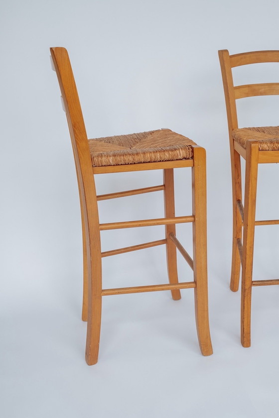 Image 1 of Ensemble de 2 tabourets de bar vintage en bois avec assise encastrée