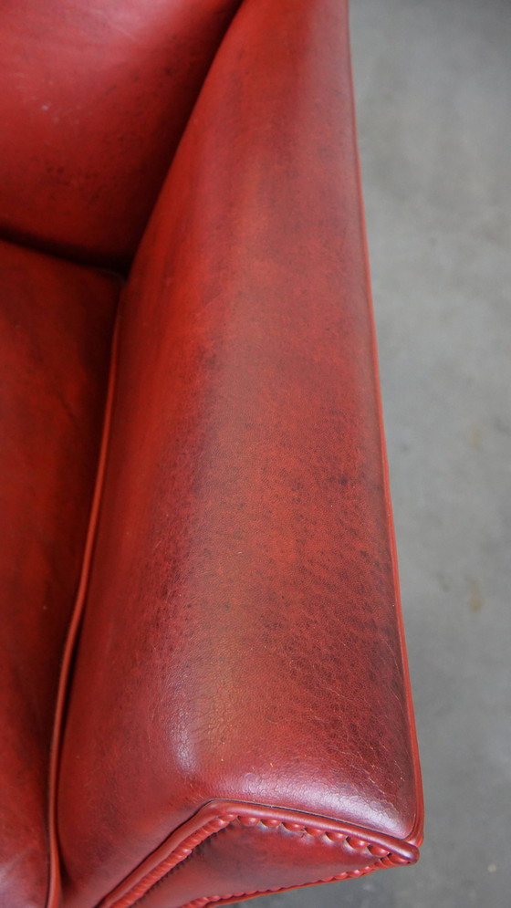 Image 1 of 2 X fauteuils design en peau de mouton de couleur rouge