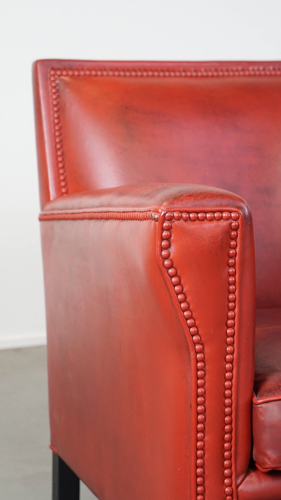 Image 1 of 2 X fauteuils design en peau de mouton de couleur rouge