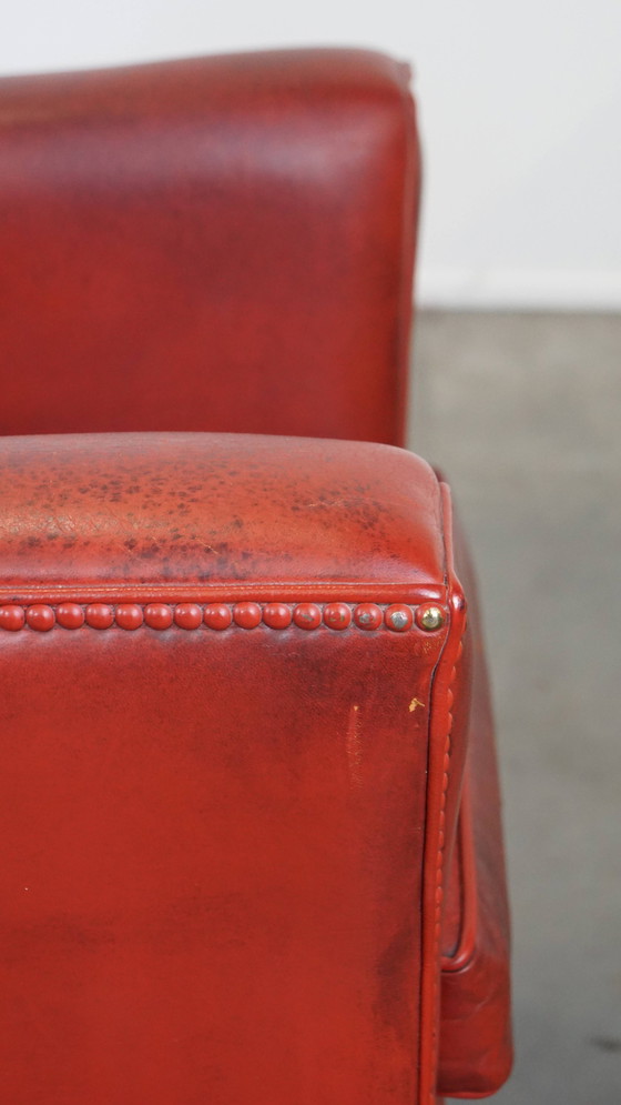 Image 1 of 2 X fauteuils design en peau de mouton de couleur rouge