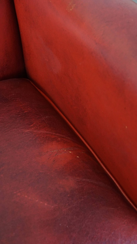 Image 1 of Fauteuil rouge en peau de mouton