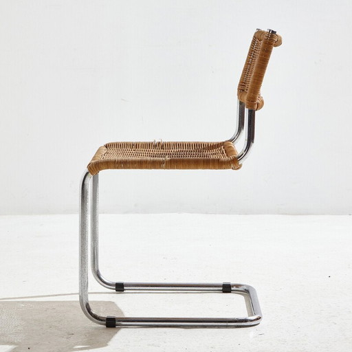 Chaise tubulaire vintage avec siège et dossier en osier, 1980