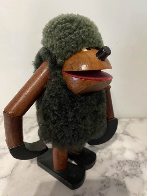 Singe suspendu en bois