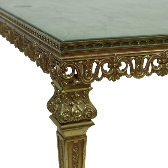 Image 1 of Table basse Hollywood Regency en cuir et laiton