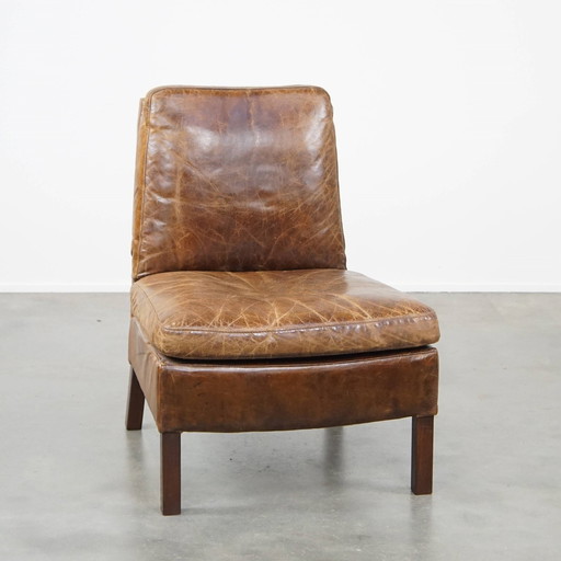 Fauteuil en cuir de bœuf