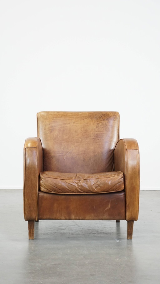 Fauteuil en cuir de bœuf couleur cognac