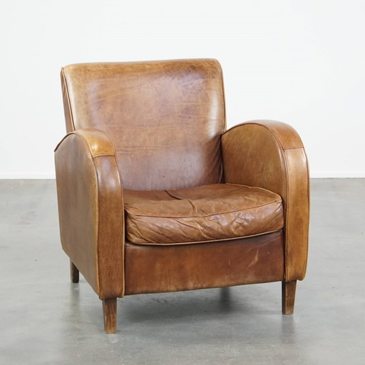 Fauteuil en cuir de bœuf couleur cognac