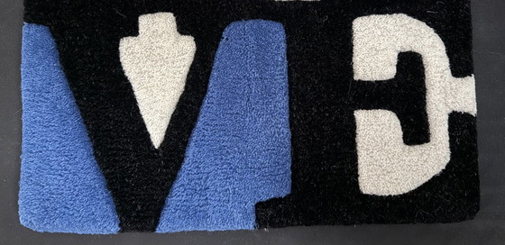 Image 1 of Robert Indiana : "Love (Stonian)". Tapis.