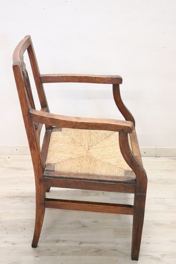 Image 1 of Fauteuil rustique ancien en bois avec assise en paille
