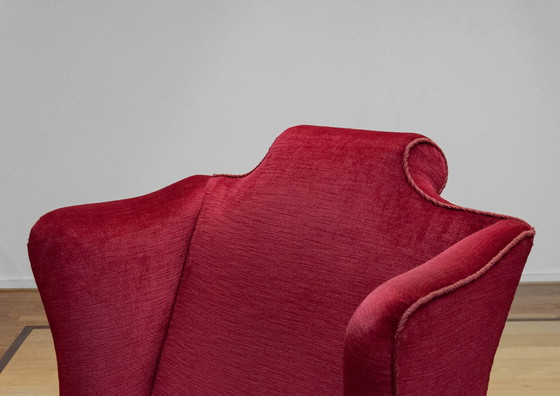 Image 1 of Fauteuil à oreilles rouges