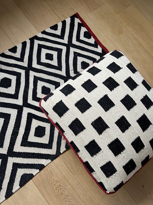 Tapis et pouf en laine Nani Marquina