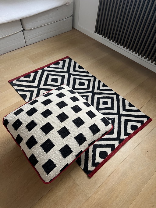 Tapis et pouf en laine Nani Marquina