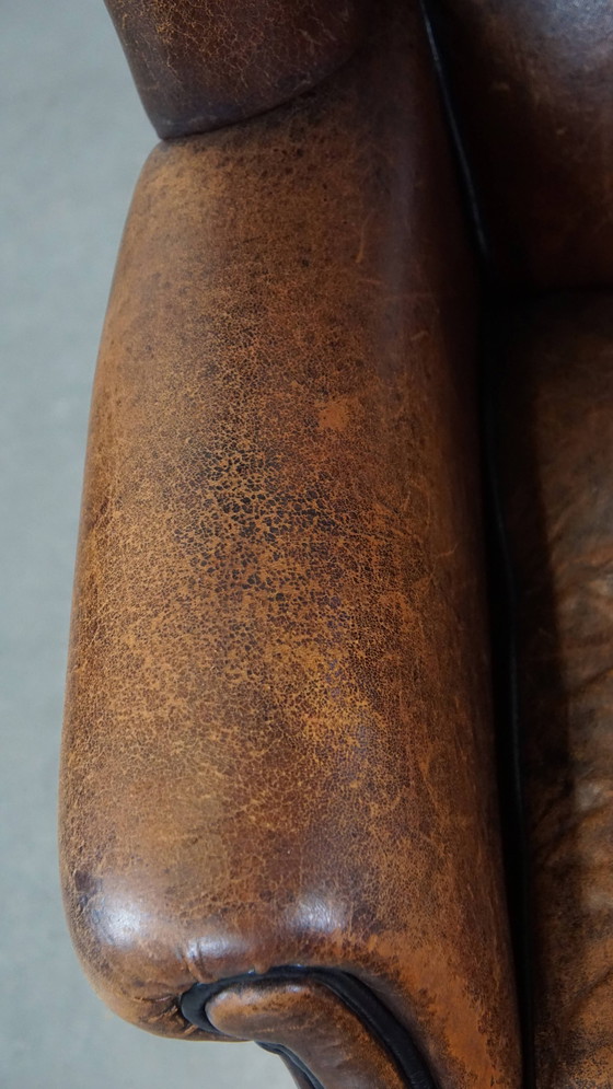 Image 1 of Fauteuil à oreilles en peau de mouton