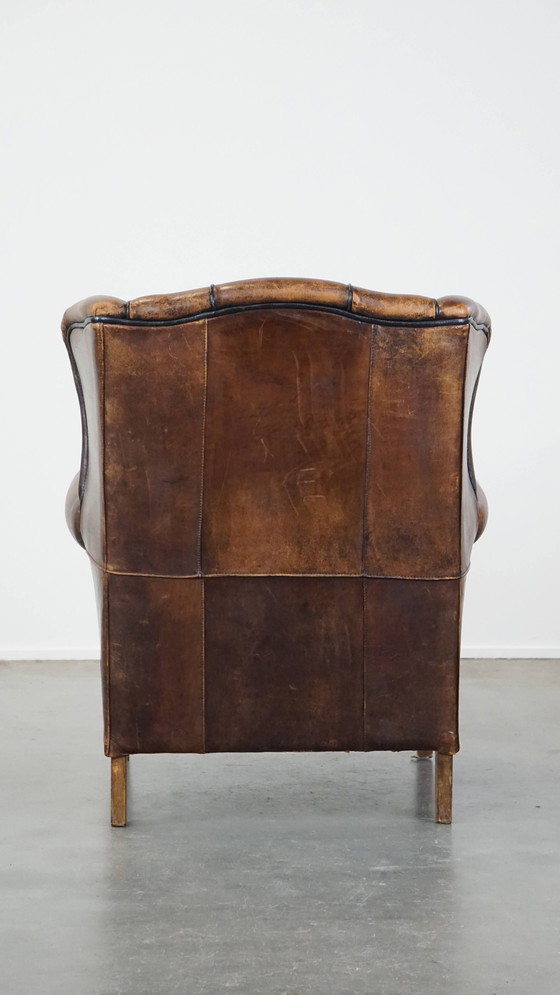 Image 1 of Fauteuil à oreilles en peau de mouton