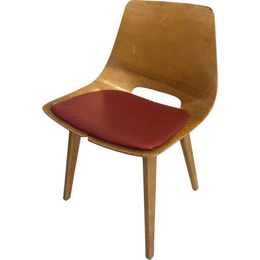 Chaise tonneau vintage Pierre de Guariche