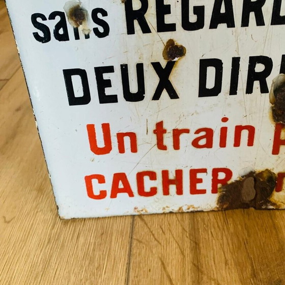 Image 1 of Vintage enamel sign "Don't cross a train may hide another", 1930