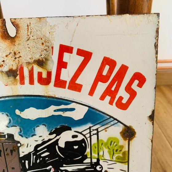 Image 1 of Vintage enamel sign "Don't cross a train may hide another", 1930
