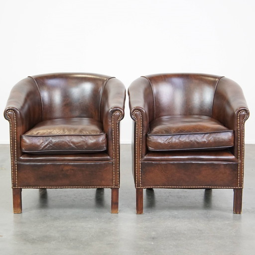 2 X fauteuils club en cuir de bœuf foncé