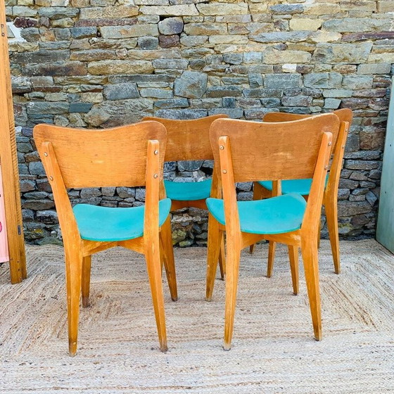 Image 1 of Ensemble de 4 chaises en bois vintage en vinyle