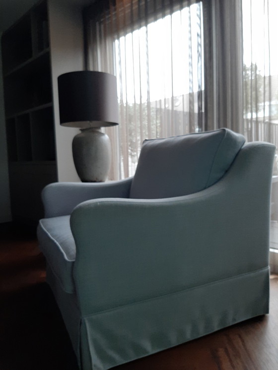 Image 1 of Chaise longue bleu clair en bon état.