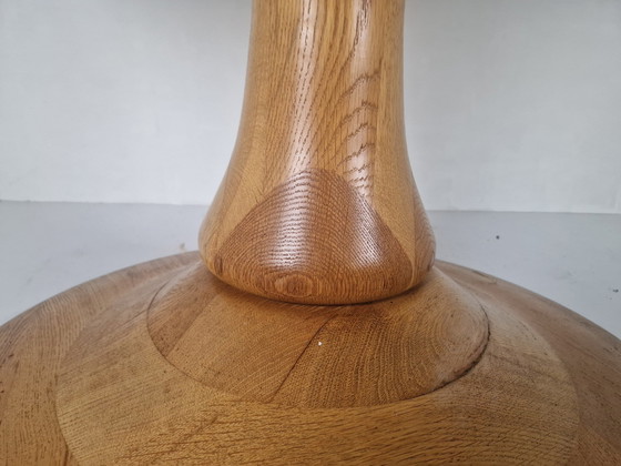 Image 1 of Table en bois massif avec pied tulipe