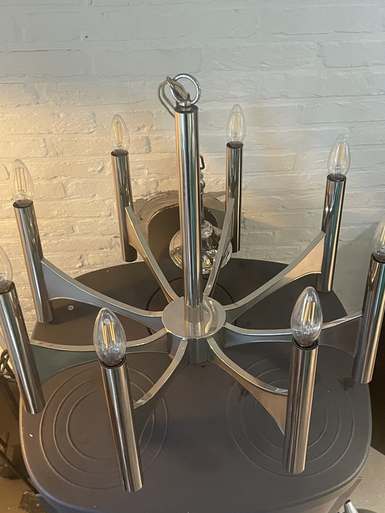 Image 1 of Lampe suspendue au design vintage conçue par Gaetano Sciolari. Lustre grand modèle avec 8 points lumineux.