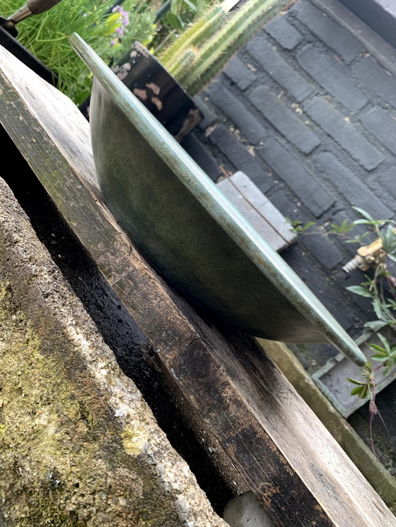 Image 1 of Grand bol en majolique verte - Romulus et Remus en relief