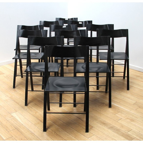 Image 1 of Ensemble de 12 chaises pliantes vintage en métal teinté noir et bois noir