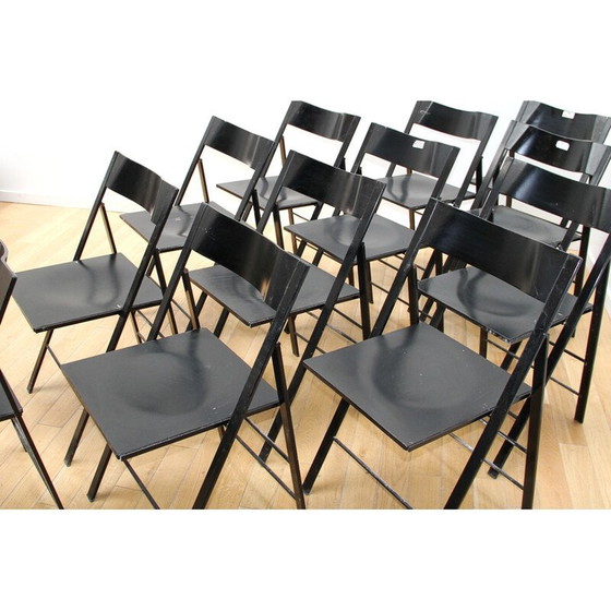 Image 1 of Ensemble de 12 chaises pliantes vintage en métal teinté noir et bois noir