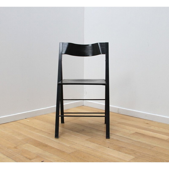 Image 1 of Ensemble de 12 chaises pliantes vintage en métal teinté noir et bois noir
