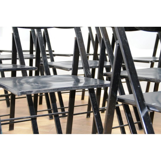 Image 1 of Ensemble de 12 chaises pliantes vintage en métal teinté noir et bois noir