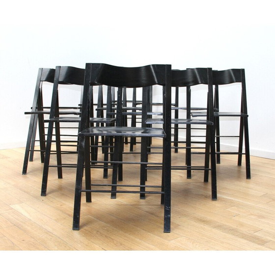 Image 1 of Ensemble de 12 chaises pliantes vintage en métal teinté noir et bois noir