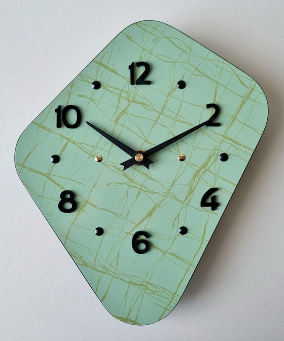 Image 1 of Horloge Vintage • Cerf-Volant • Odo • Space Age • 1950