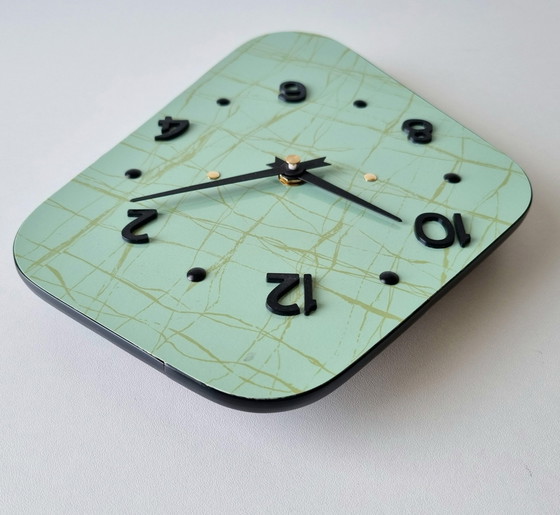 Image 1 of Horloge Vintage • Cerf-Volant • Odo • Space Age • 1950