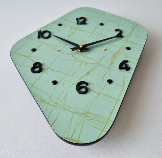 Image 1 of Horloge Vintage • Cerf-Volant • Odo • Space Age • 1950