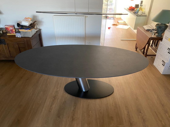 Image 1 of Le nouveau monde de Bree. Table d'angle 169 Libra Oval + 6 Fauteuils 283 Tanto Acier inoxydable