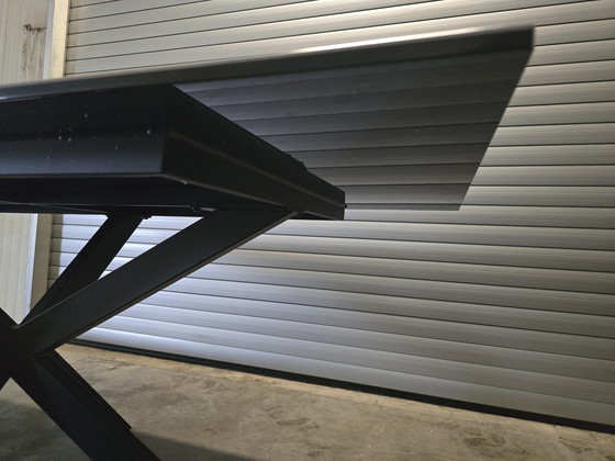 Image 1 of Table en céramique pierre grise avec base araignée