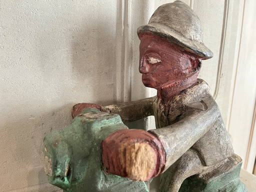 Statue coloniale vintage en bois