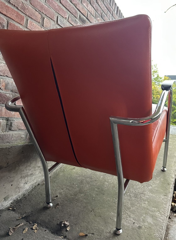 Image 1 of Fauteuil design orange Structure tubulaire moderne