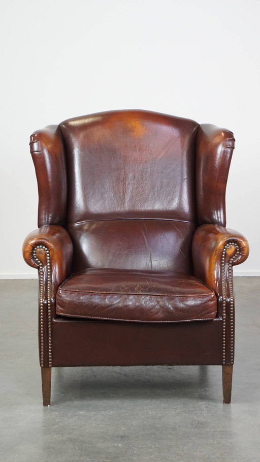 Fauteuil à oreilles en peau de mouton