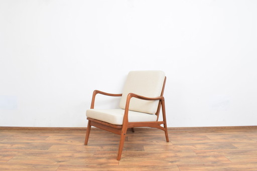 Fauteuil en teck danois du Mid Century, années 1960.